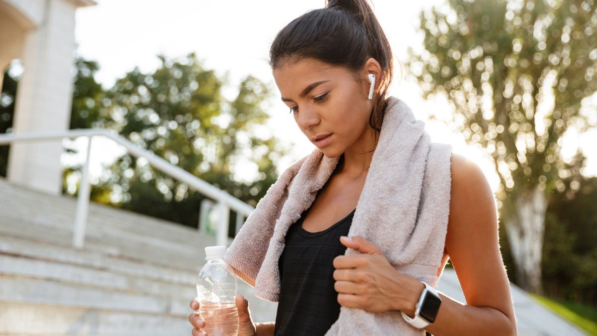 woman working out towel