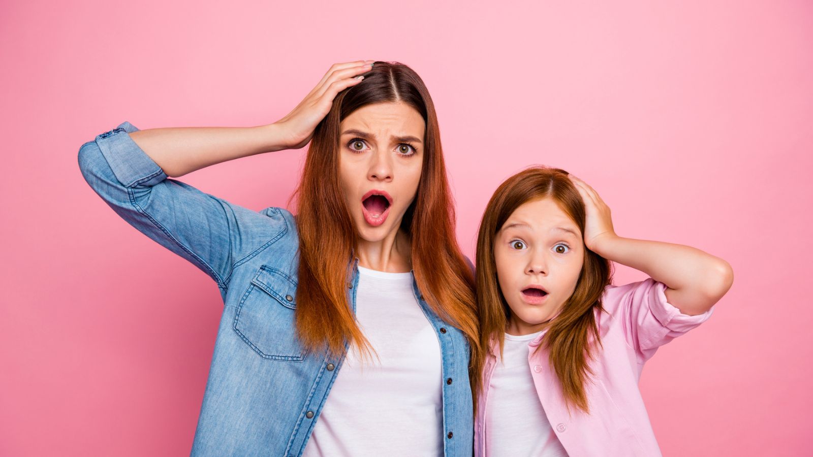 woman mom with daughter girl shocked