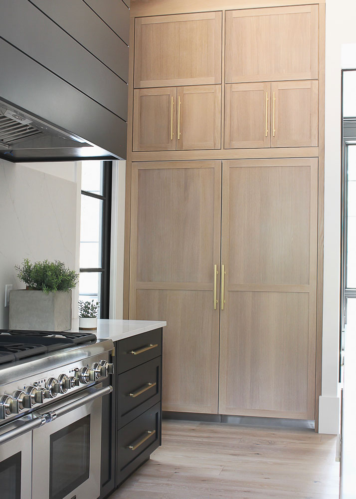 Hidden refrigerator in a modern kitchen.