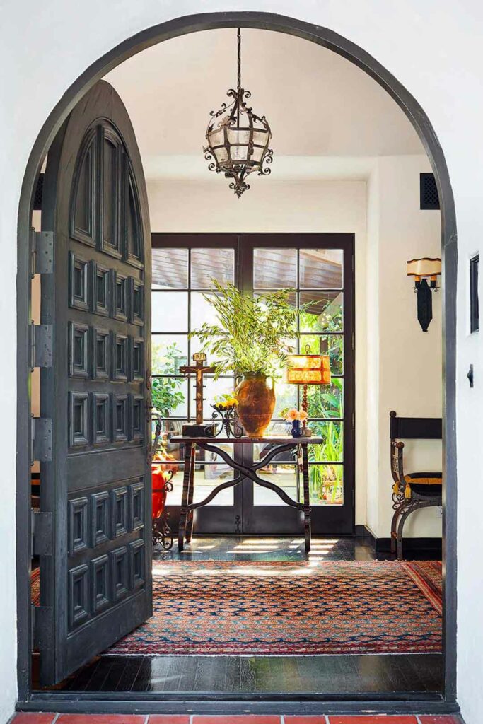 Large Spanish style arched front door.