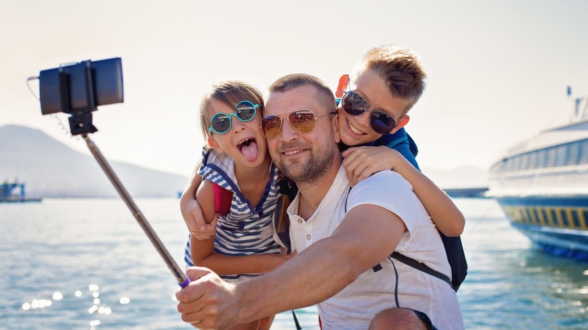 kids dad selfie travel sunglasses