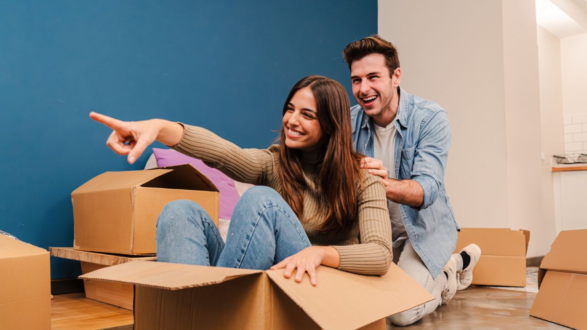 couple in moving boxes