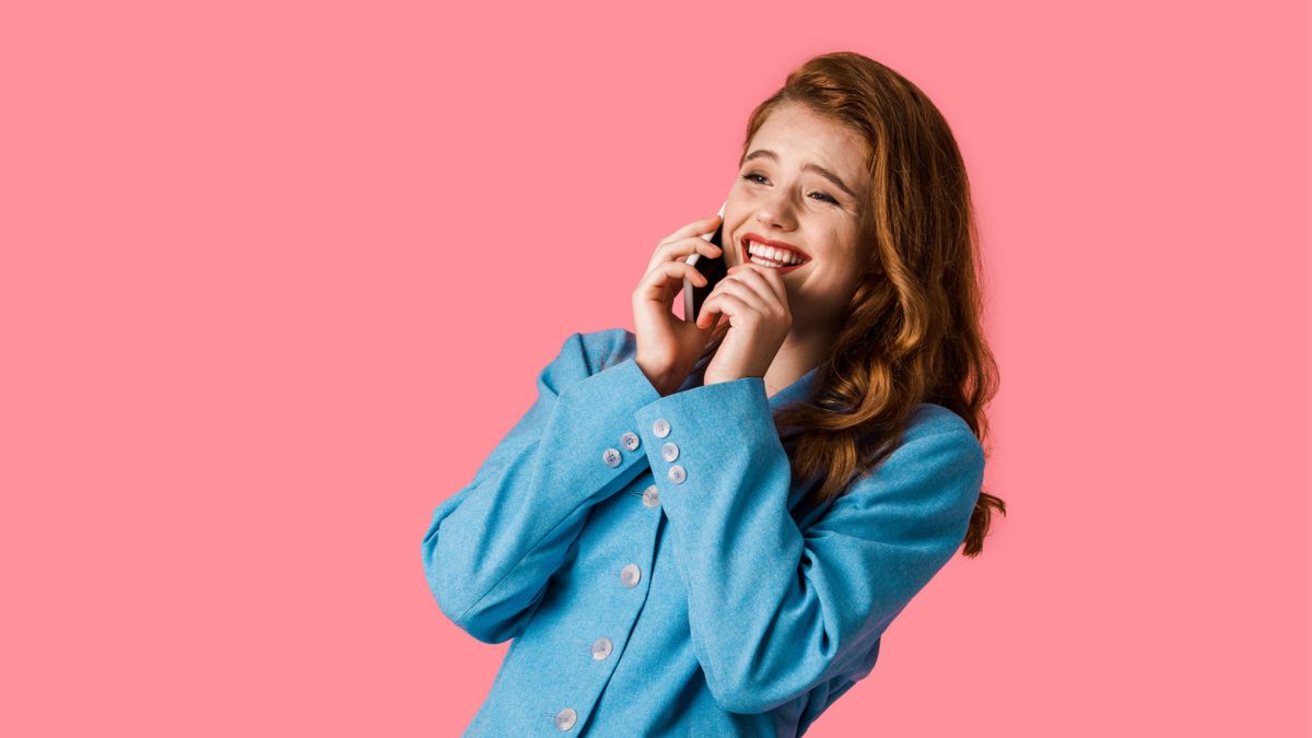 woman laughing on the phone mobile