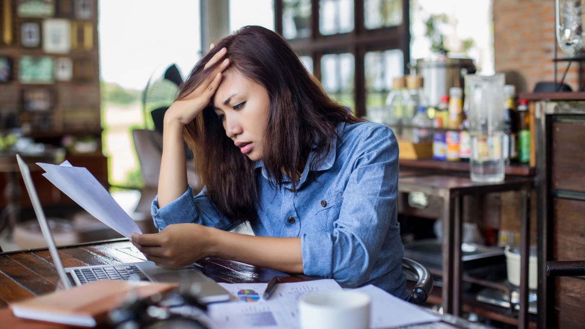 woman stressed out at computer laptop