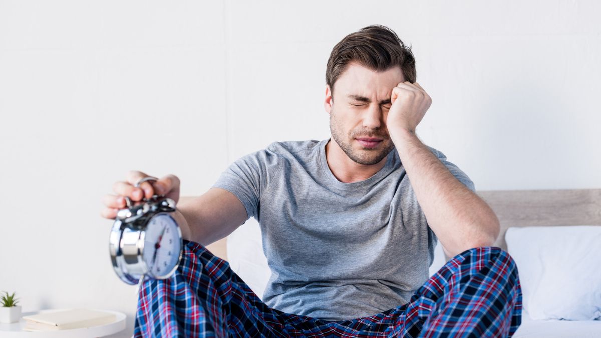 man overslept with clock