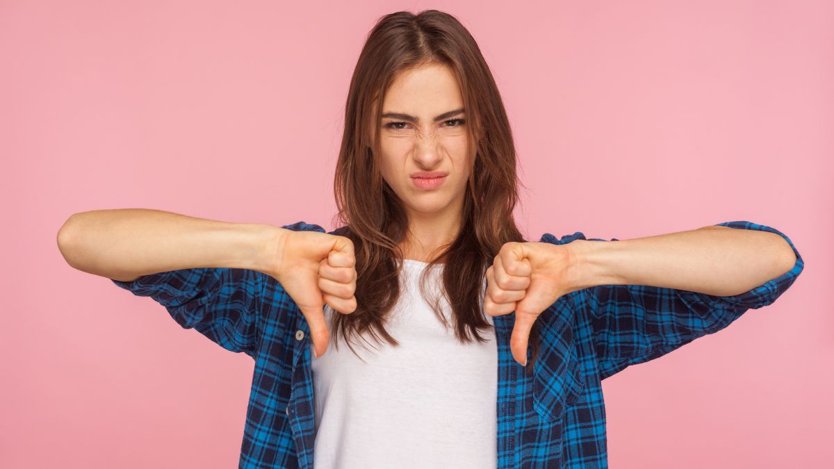 woman doing a thumbs down