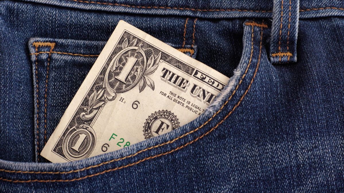 dollar in a jean pocket