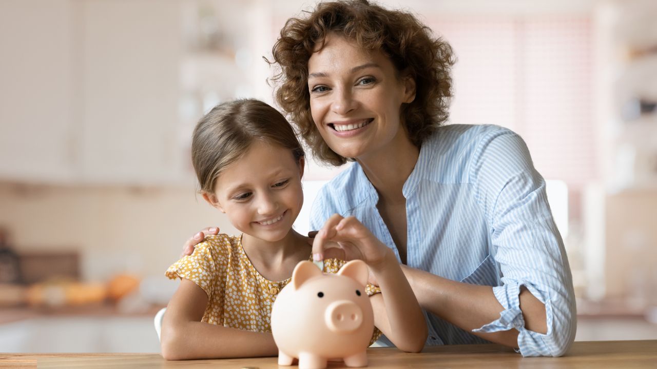 mom and daughter piggy bank