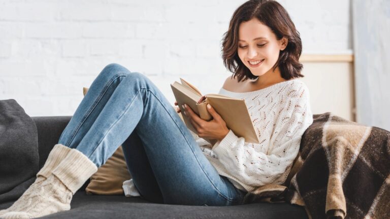 Smiling girl reading