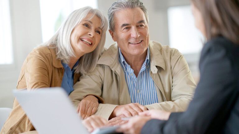 Couple meeting financial adviser