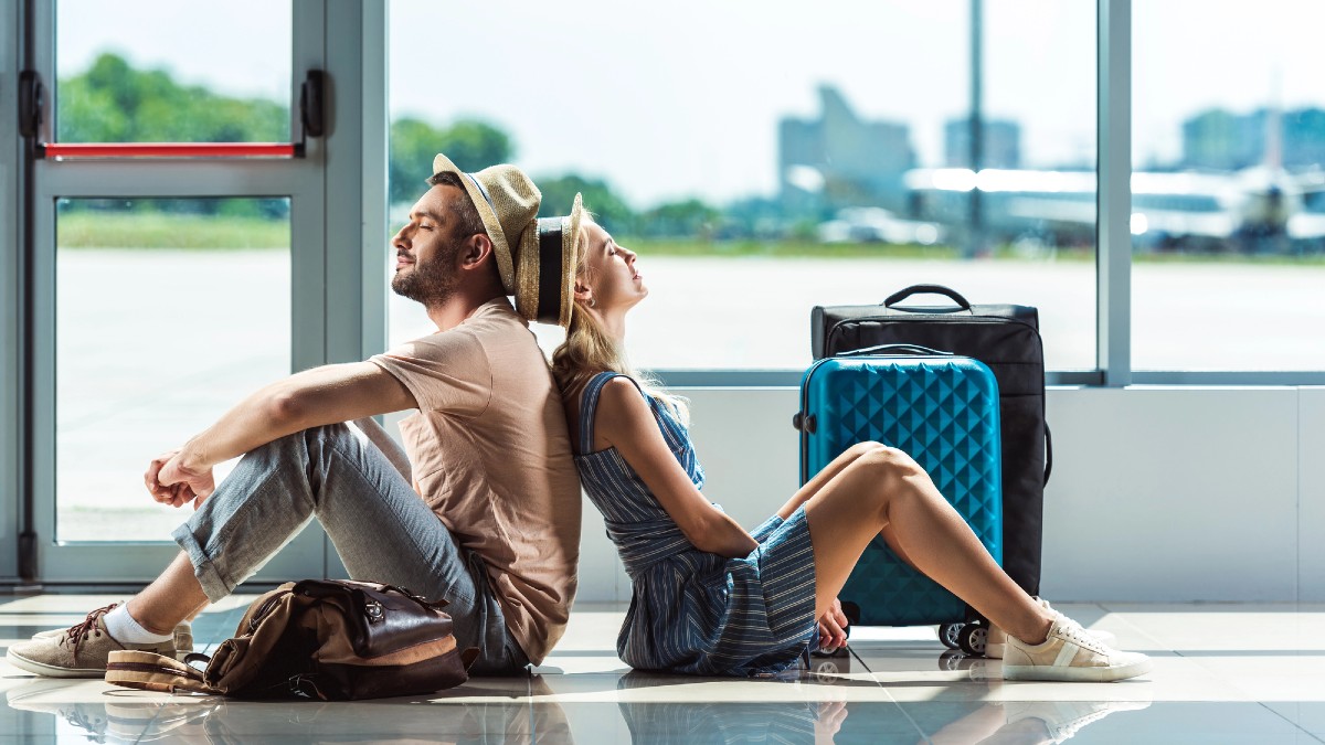 Couple waiting for boarding in airport