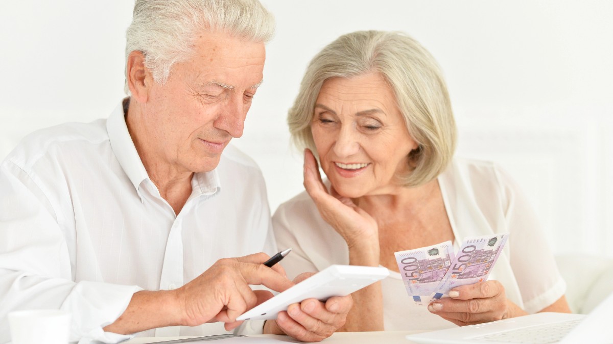 Senior businessman counting money