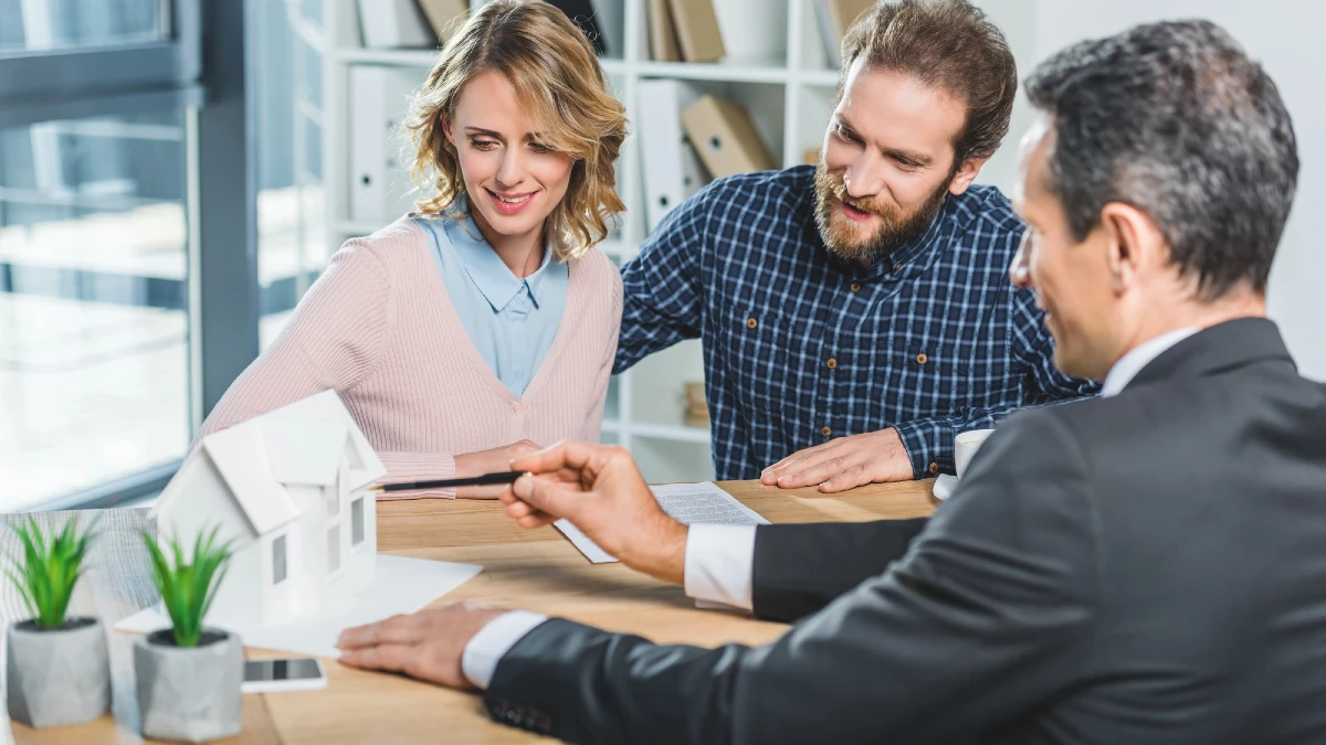 Couple at real estate agency