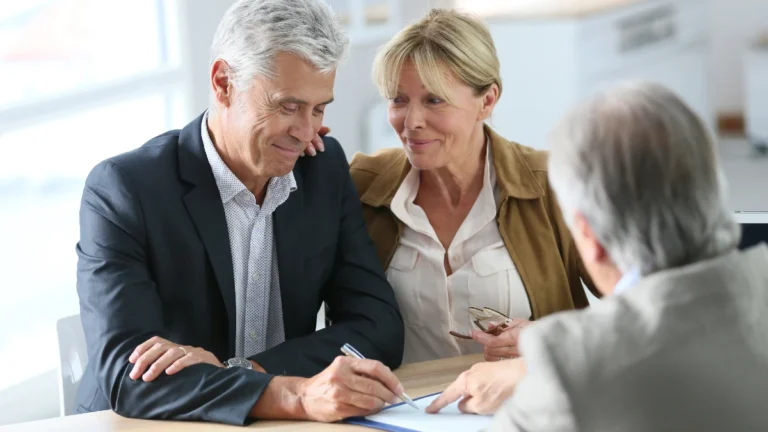 Couple meeting agent for investment