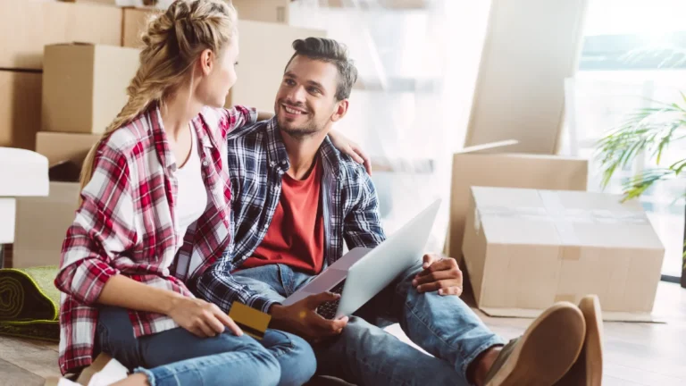 Couple with laptop and credit card