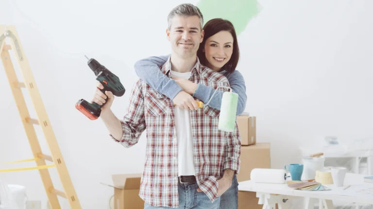 Loving couple doing home renovations