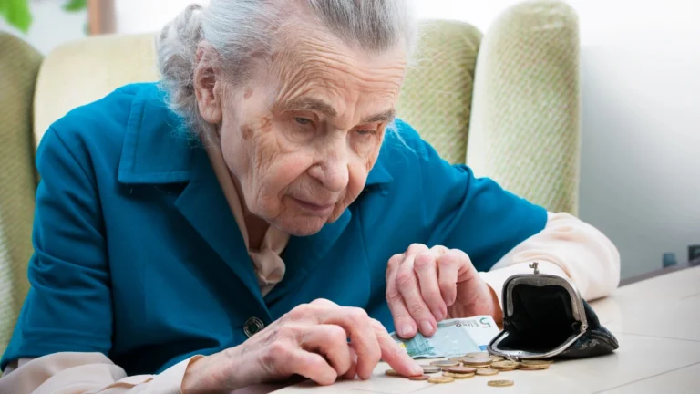 Senior woman counting money