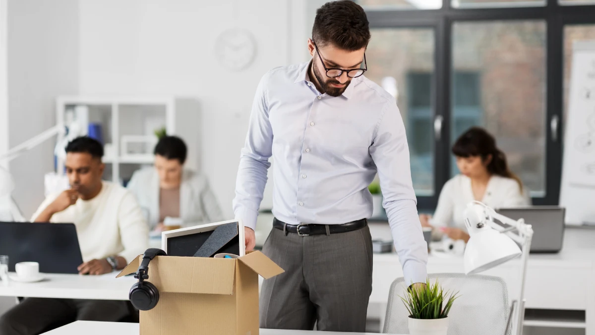 man leaving office