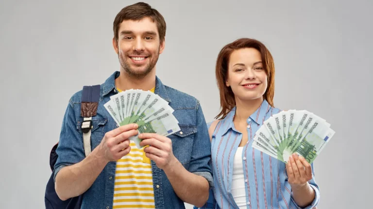 Couple of tourists with backpacks and money