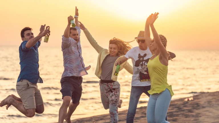 Group of friends enjoy on the beach