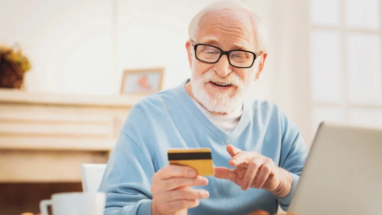 Man checking his debit card number while