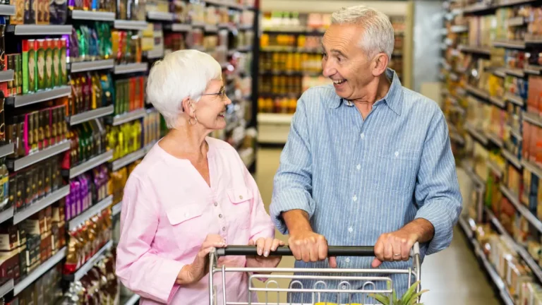 Senior couple shopping in grocery store