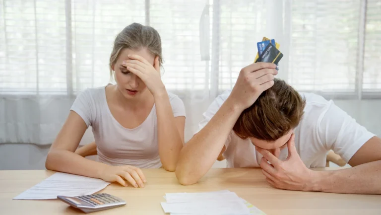 Young caucasian couple hand holding credit card