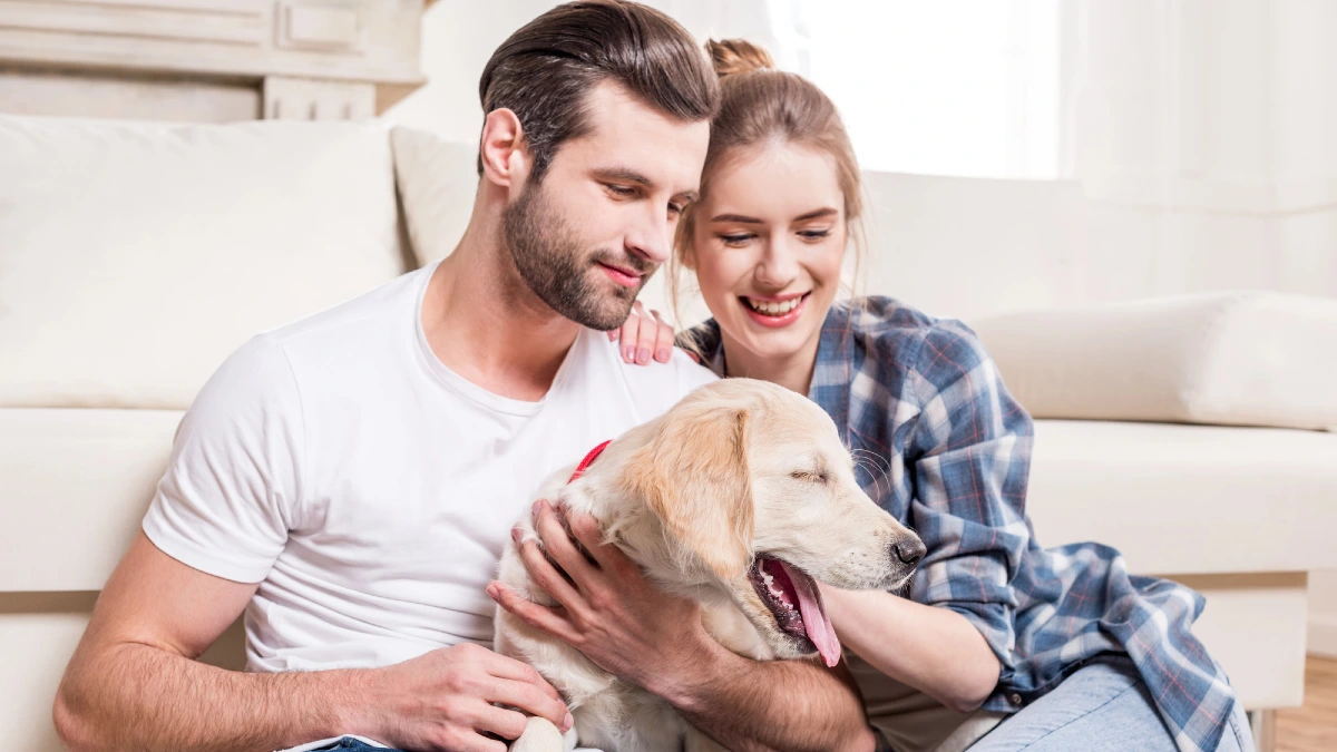 Young couple with puppy
